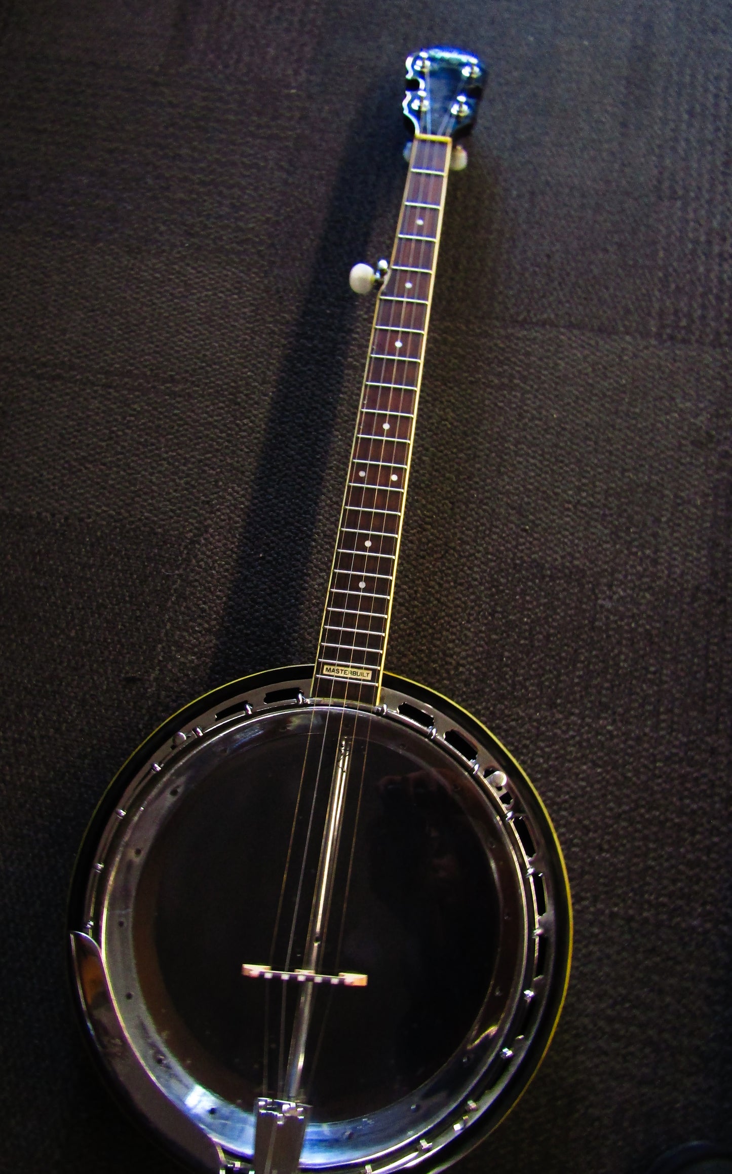 Epiphone Masterbuilt Bluegrass banjo.
